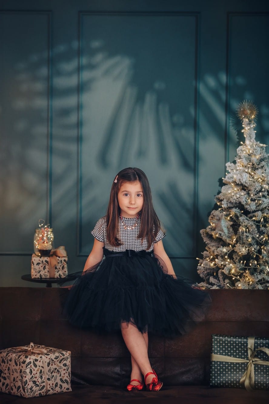 Fotoricordo professionale di una bambina a Natale