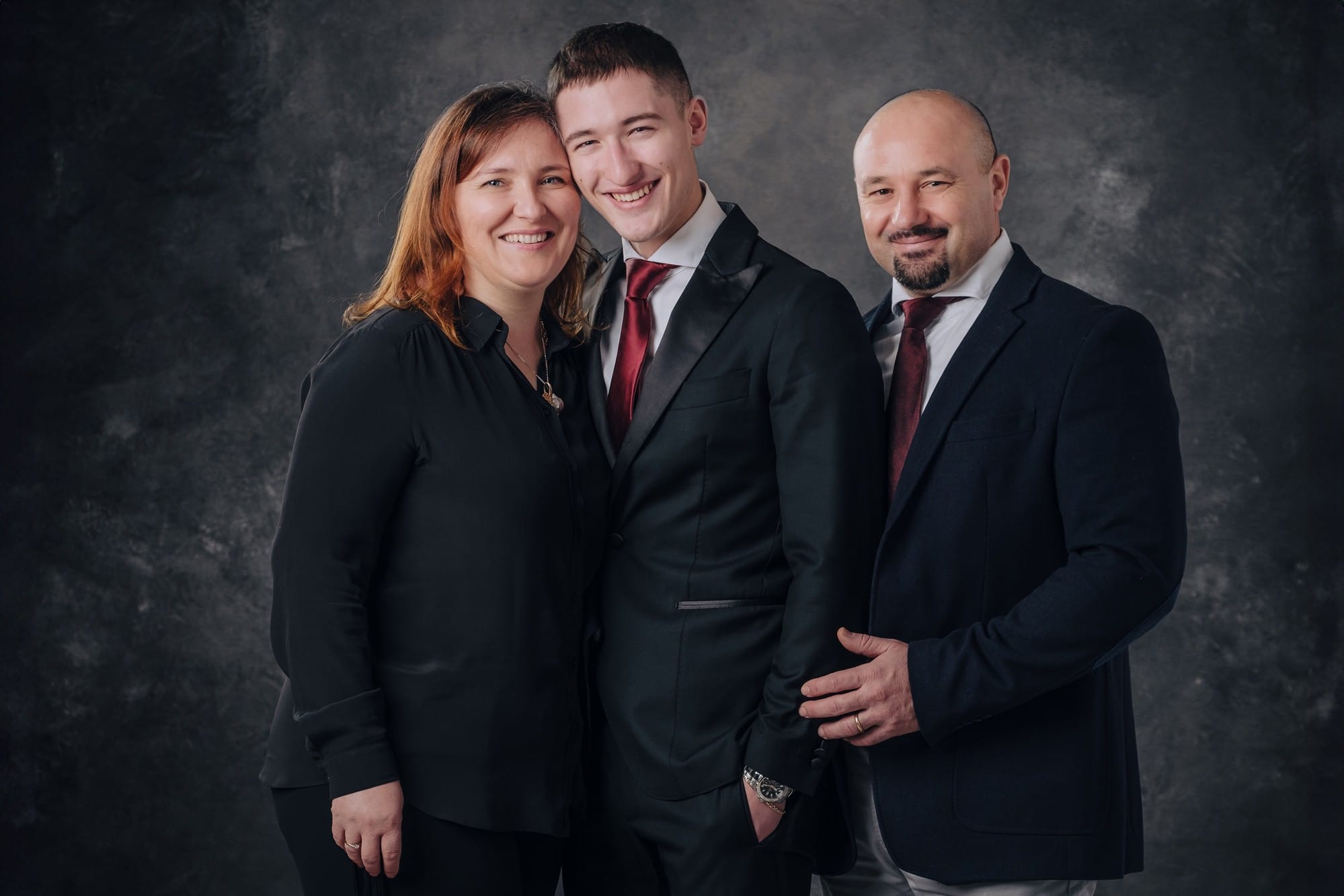 Ritratto di famiglia per laurea Ritratto di famiglia con figlio appena laureato