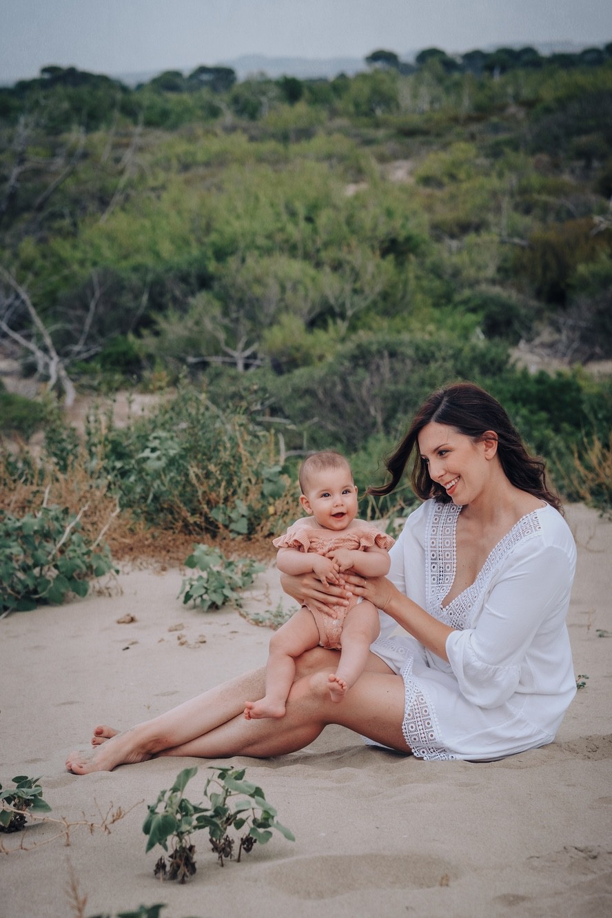 Fotoritratto professionale di una mamma col suo neonato