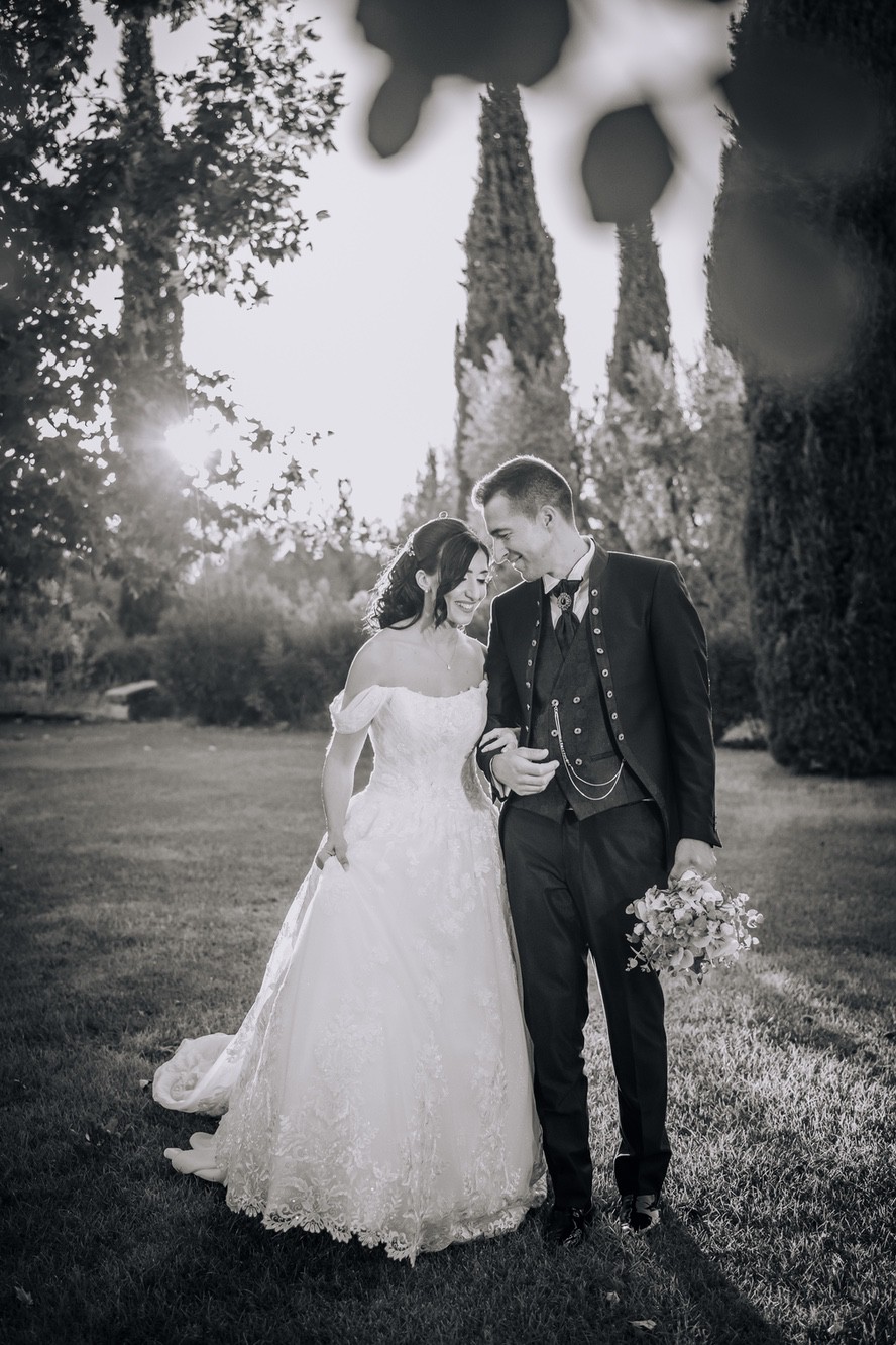 Scatto fotografico sposi con bouquet